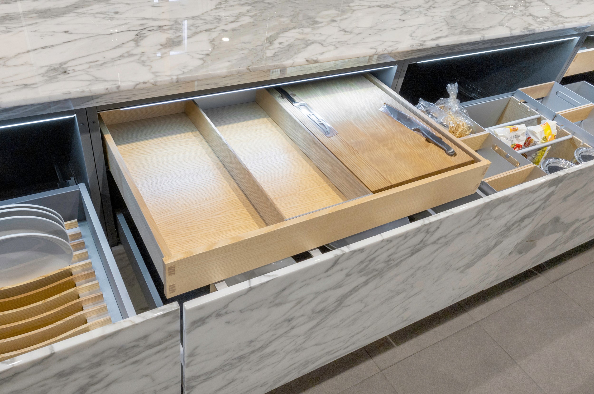 eggersmann USA Chablis Vintage Oak & Steel Grey Modern Kitchen with Arabescato Waterfall Island and Miele Appliance Suite