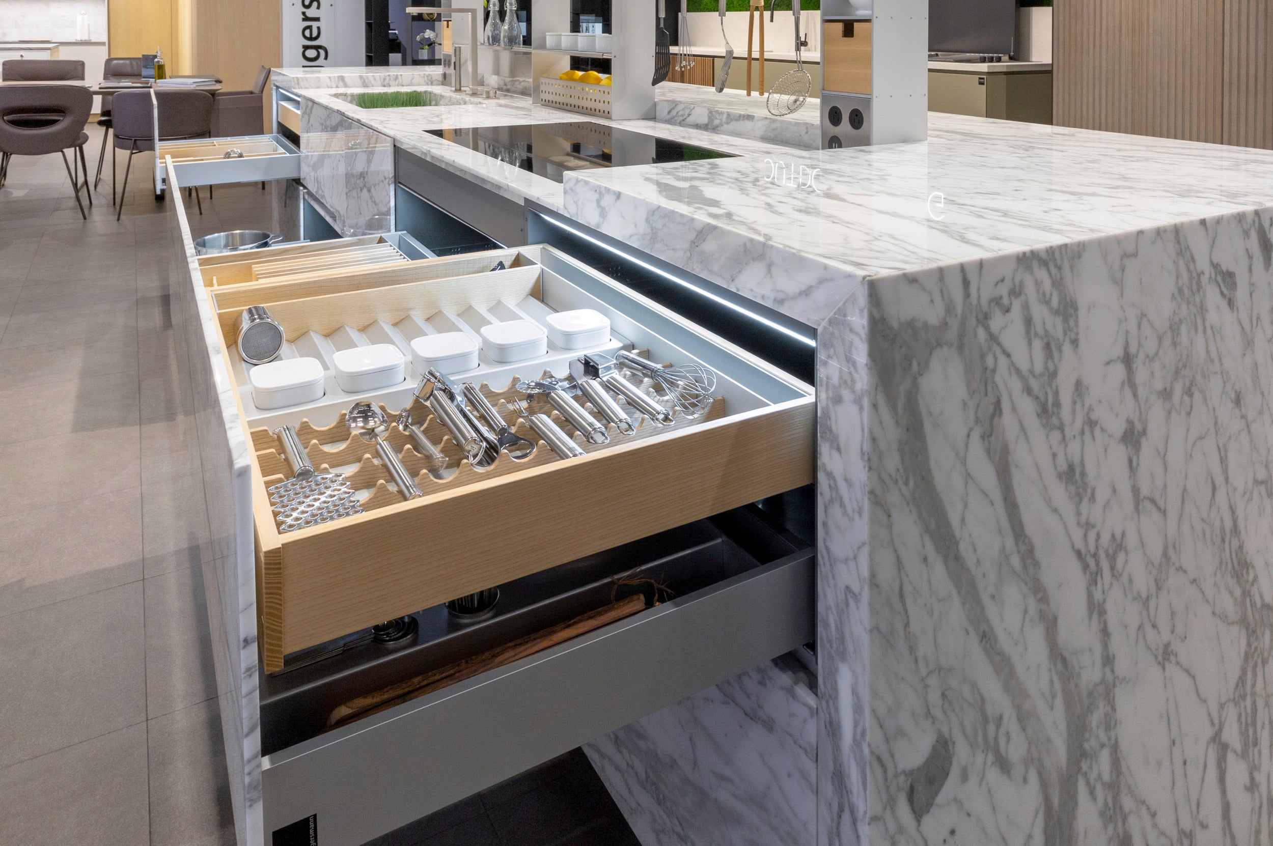eggersmann USA Chablis Vintage Oak & Steel Grey Modern Kitchen with Arabescato Waterfall Island and Miele Appliance Suite