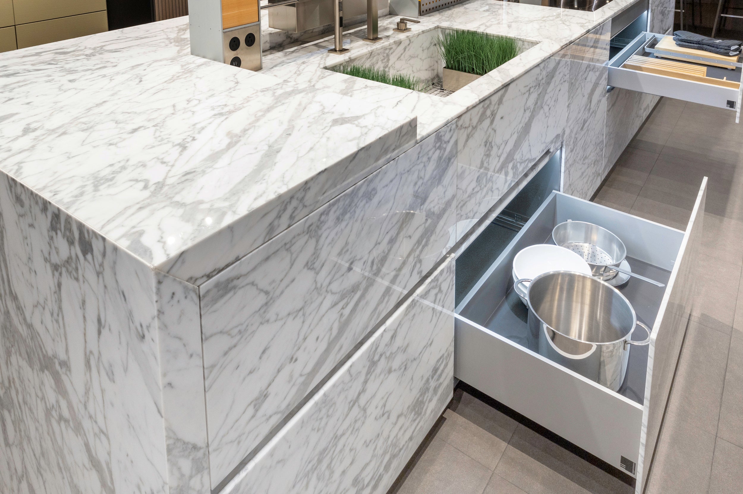 eggersmann USA Chablis Vintage Oak & Steel Grey Modern Kitchen with Arabescato Waterfall Island and Miele Appliance Suite