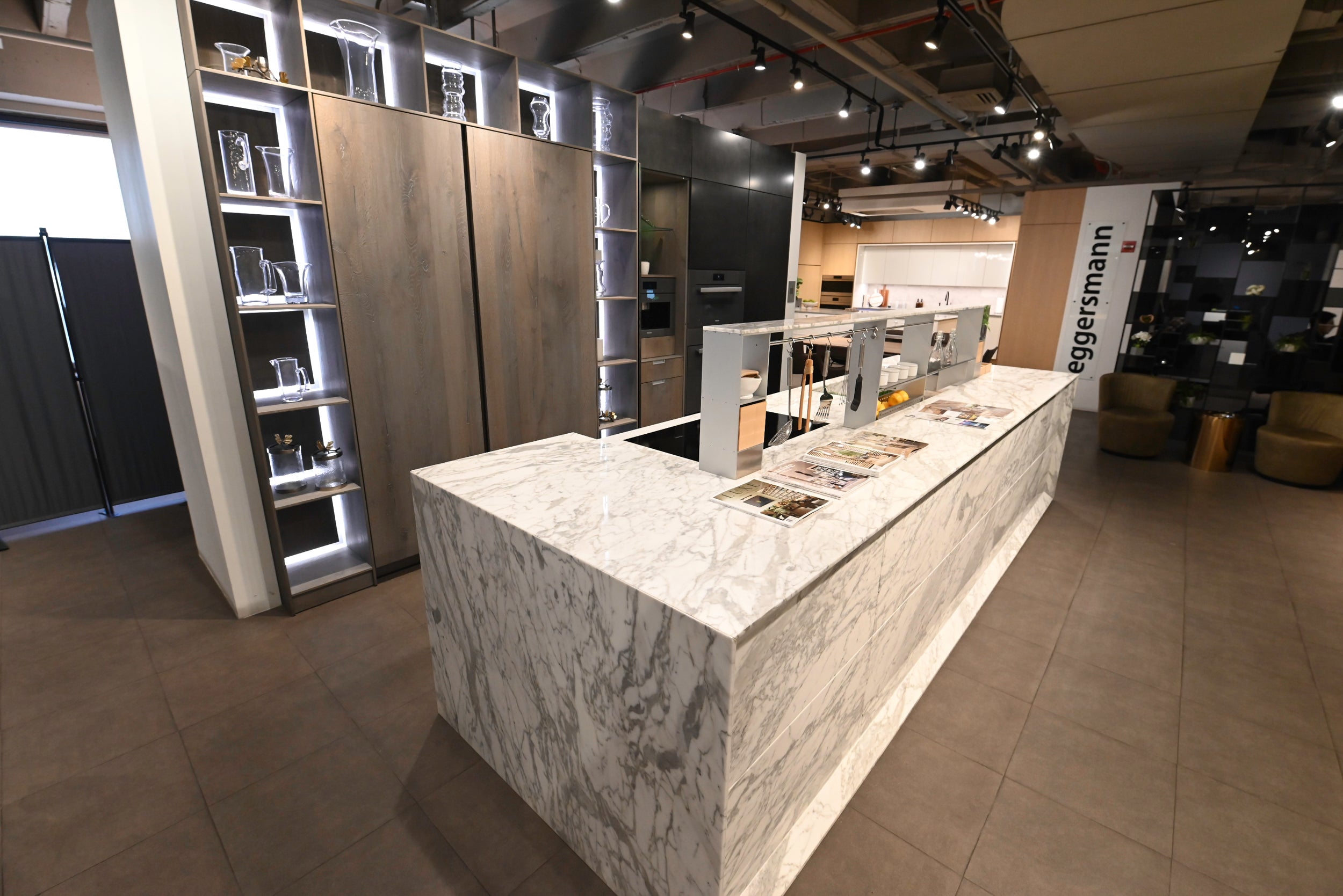 eggersmann USA Chablis Vintage Oak & Steel Grey Modern Kitchen with Arabescato Waterfall Island and Miele Appliance Suite