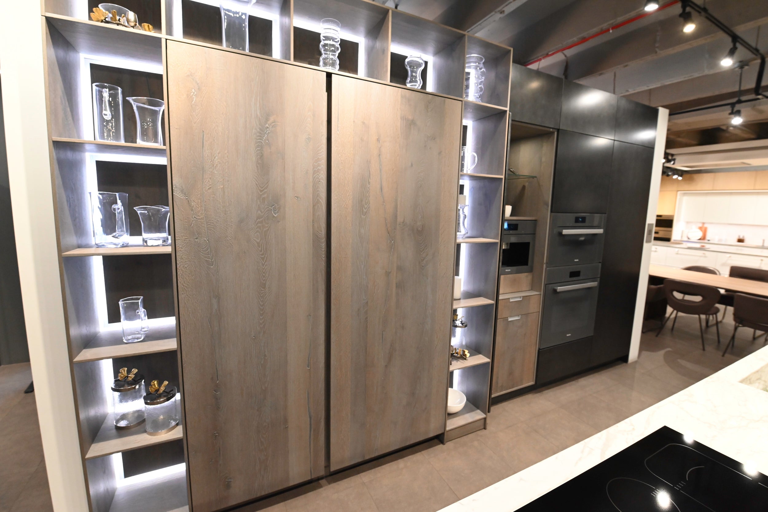 eggersmann USA Chablis Vintage Oak & Steel Grey Modern Kitchen with Arabescato Waterfall Island and Miele Appliance Suite