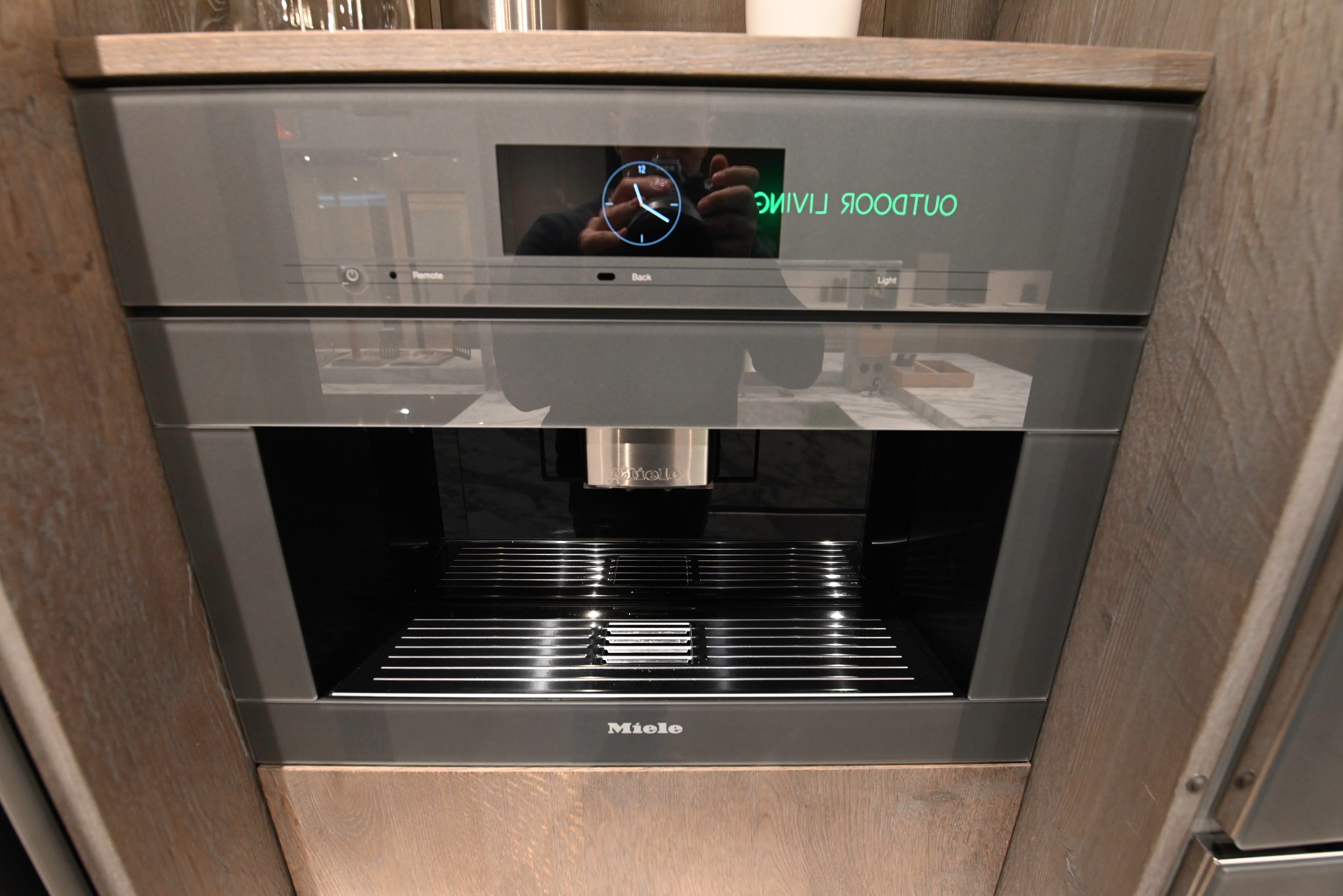eggersmann USA Chablis Vintage Oak & Steel Grey Modern Kitchen with Arabescato Waterfall Island and Miele Appliance Suite