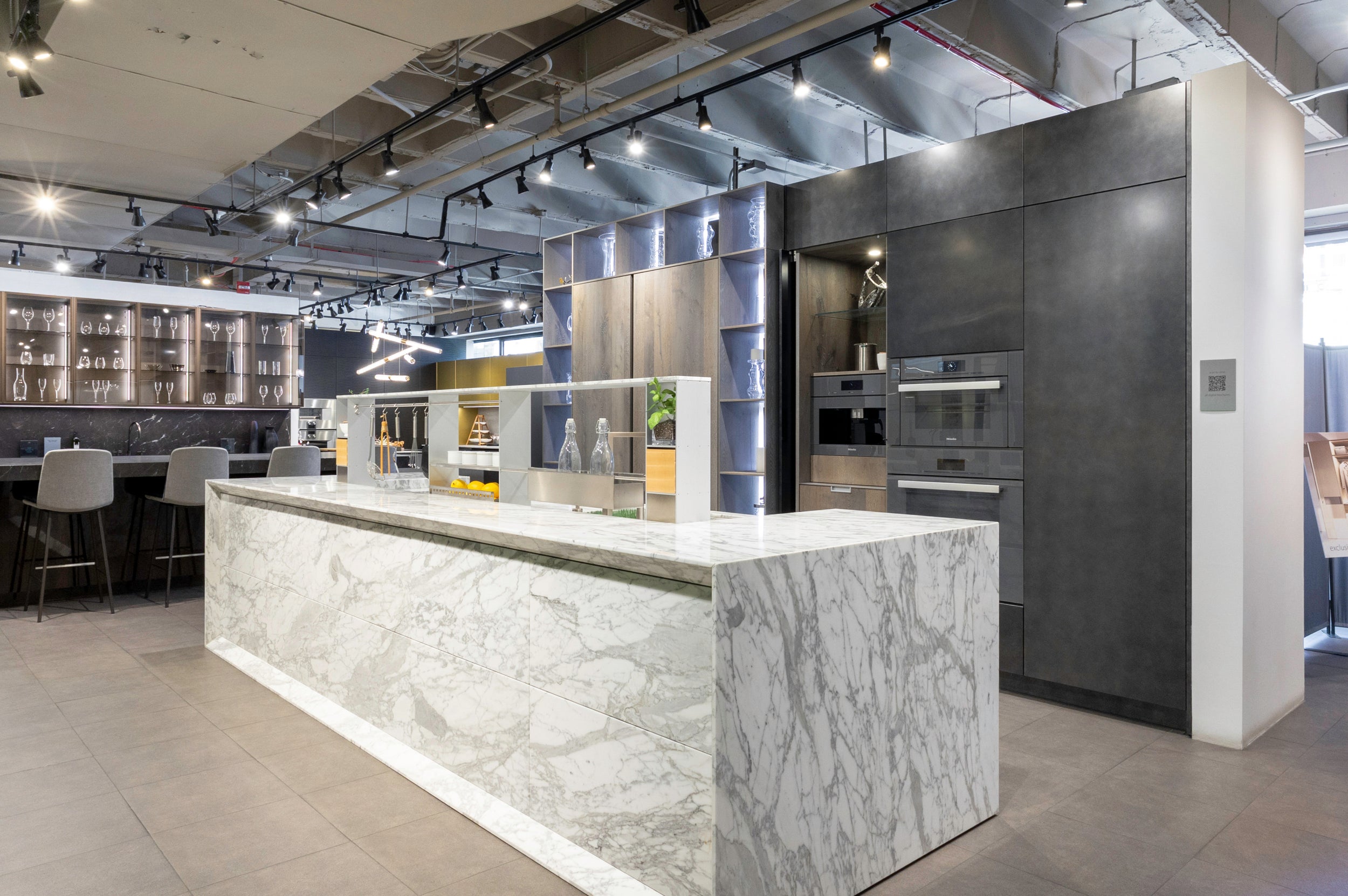 eggersmann USA Chablis Vintage Oak & Steel Grey Modern Kitchen with Arabescato Waterfall Island and Miele Appliance Suite