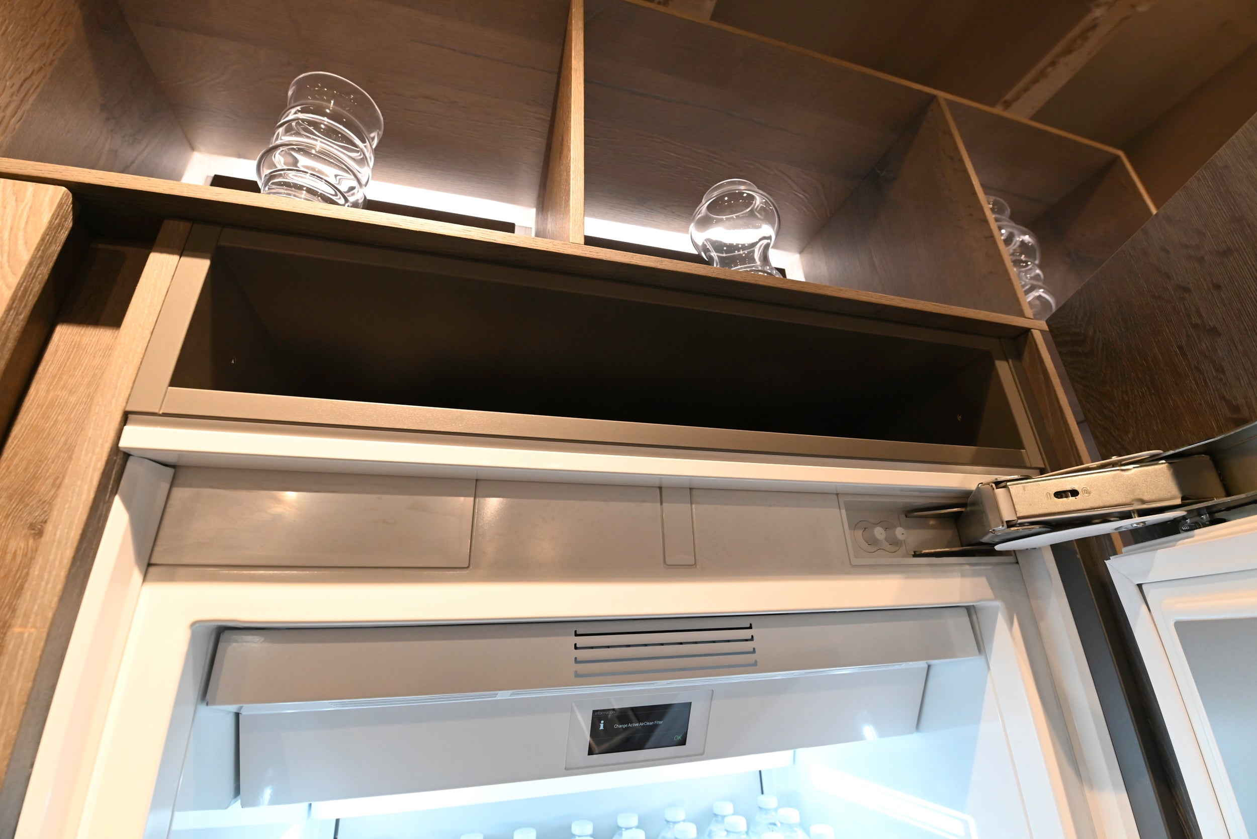 eggersmann USA Chablis Vintage Oak & Steel Grey Modern Kitchen with Arabescato Waterfall Island and Miele Appliance Suite