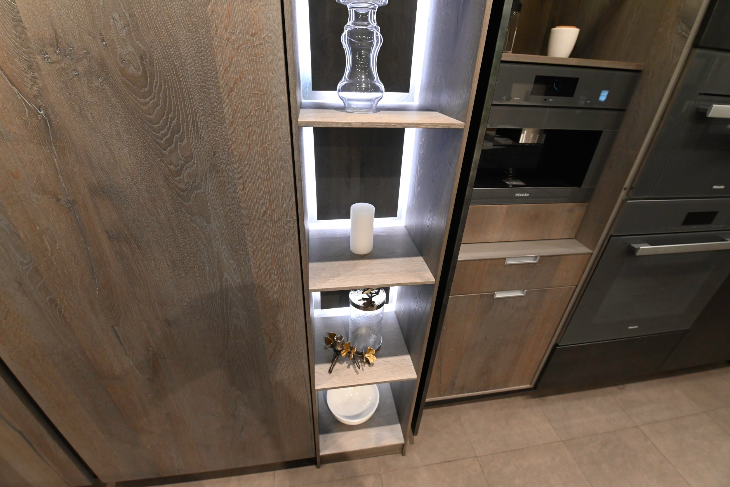 eggersmann USA Chablis Vintage Oak & Steel Grey Modern Kitchen with Arabescato Waterfall Island and Miele Appliance Suite