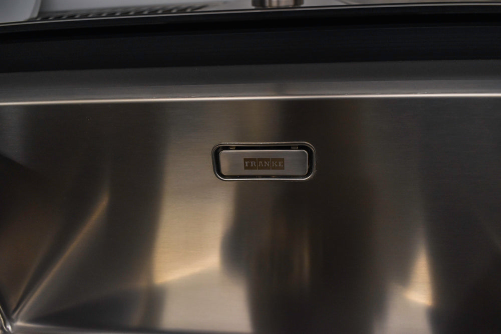 Valcucine Modern Minimalist Brown Toned Kitchen with Glass Countertops