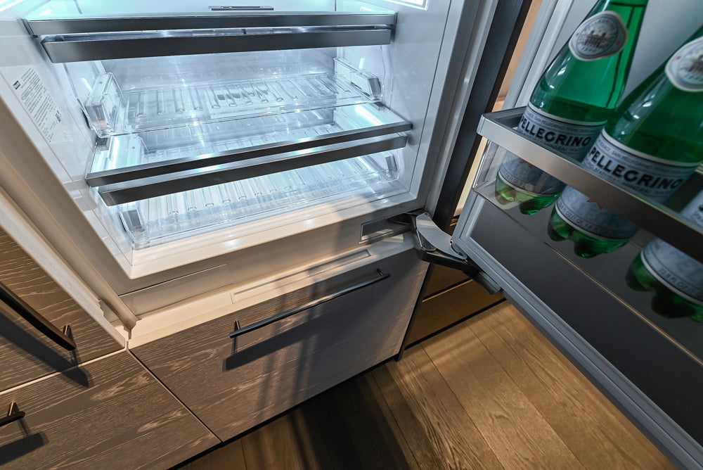 Modern White and Brown Wood Veneer Kitchen with Waterfall Island, Marble Countertops & Miele Appliances