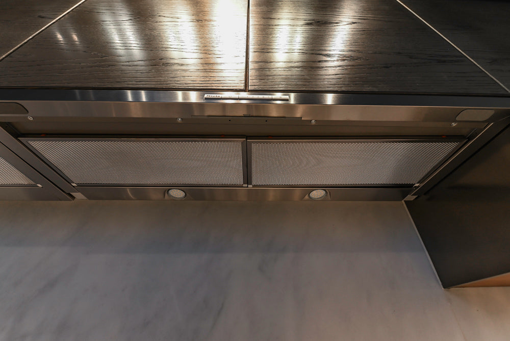 Modern White and Brown Wood Veneer Kitchen with Waterfall Island, Marble Countertops & Miele Appliances