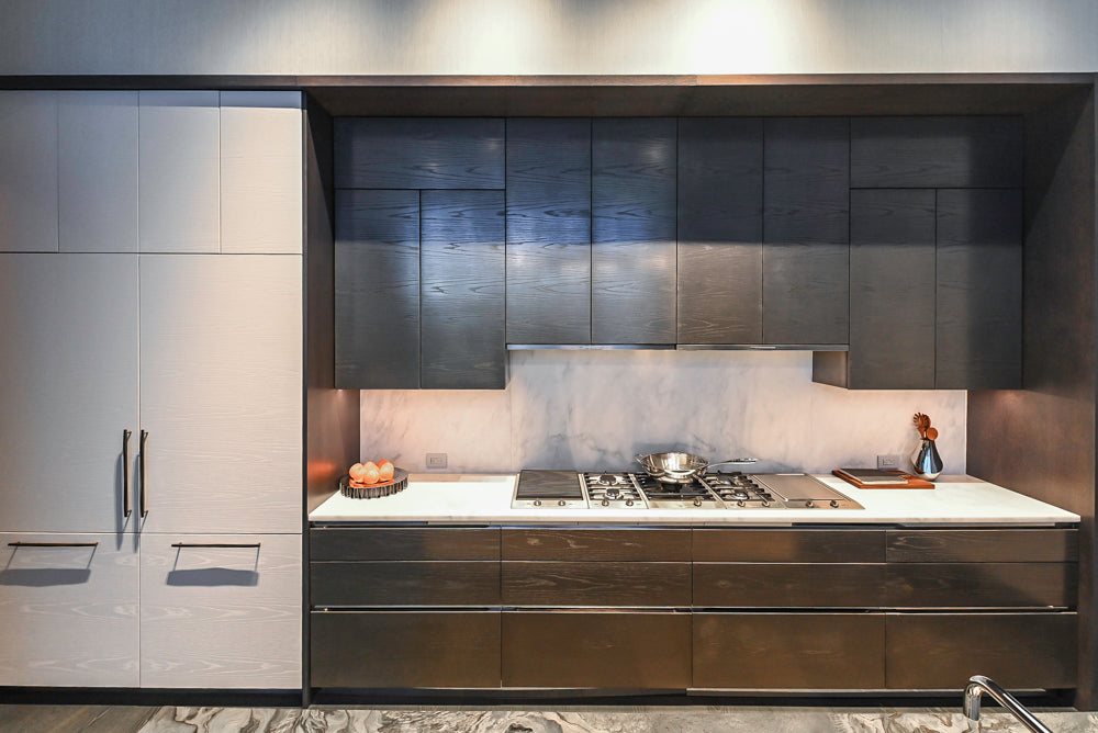 Modern White and Brown Wood Veneer Kitchen with Waterfall Island, Marble Countertops & Miele Appliances