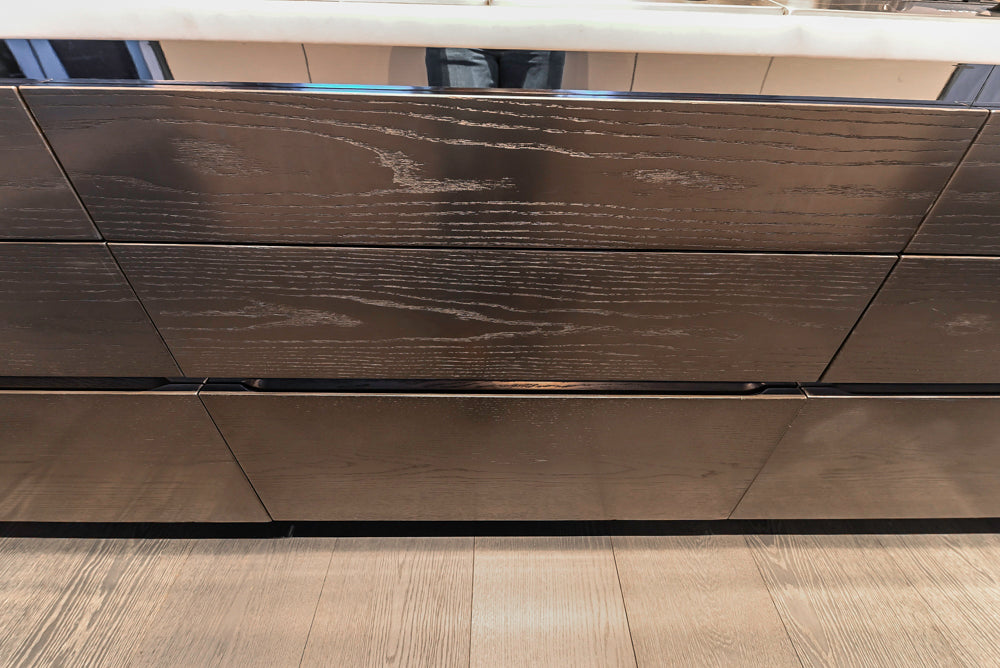 Modern White and Brown Wood Veneer Kitchen with Waterfall Island, Marble Countertops & Miele Appliances