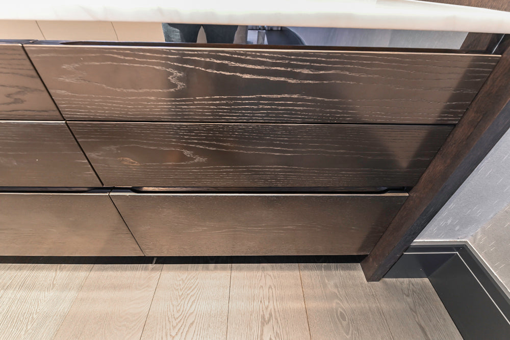 Modern White and Brown Wood Veneer Kitchen with Waterfall Island, Marble Countertops & Miele Appliances