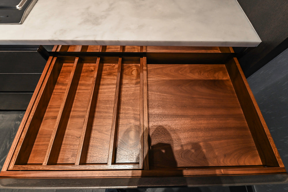 Modern White and Brown Wood Veneer Kitchen with Waterfall Island, Marble Countertops & Miele Appliances