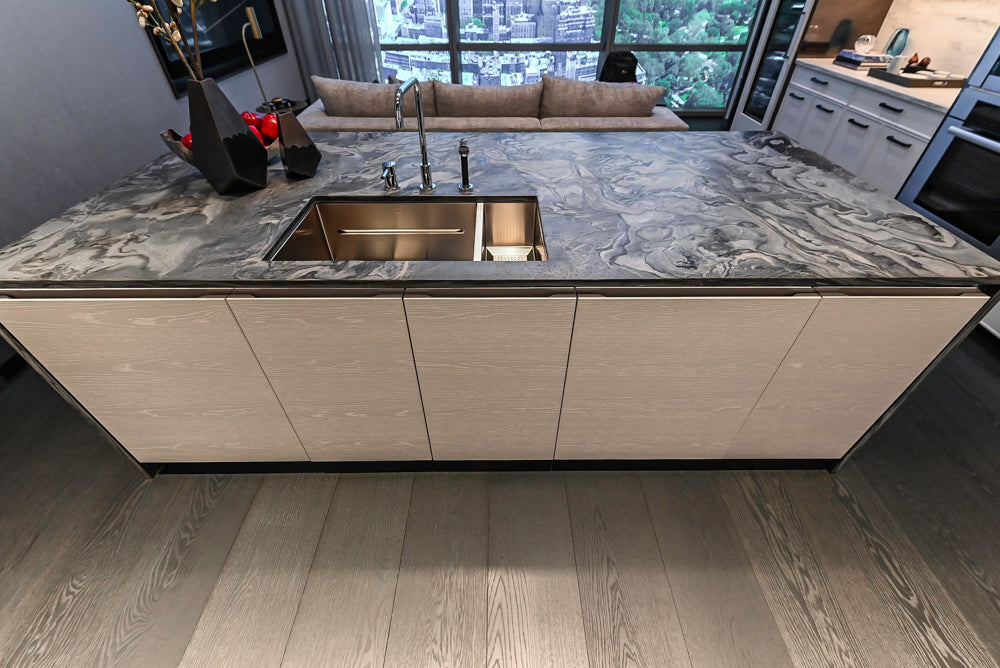 Modern White and Brown Wood Veneer Kitchen with Waterfall Island, Marble Countertops & Miele Appliances