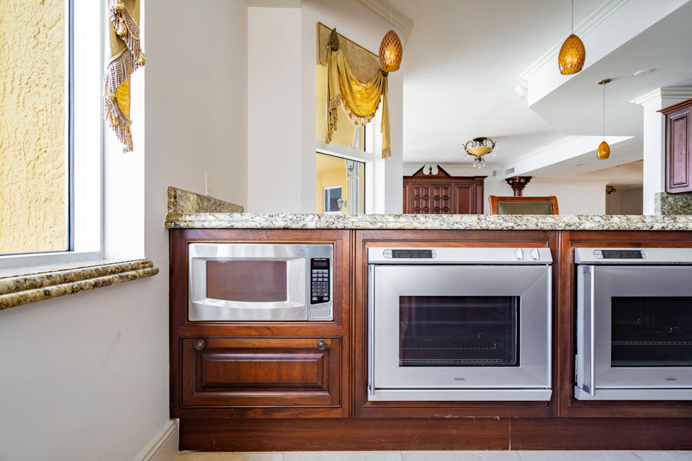 Clive Christian Regency Style Traditional Mahogany Kitchen with Granite Countertops & Gaggenau Appliances