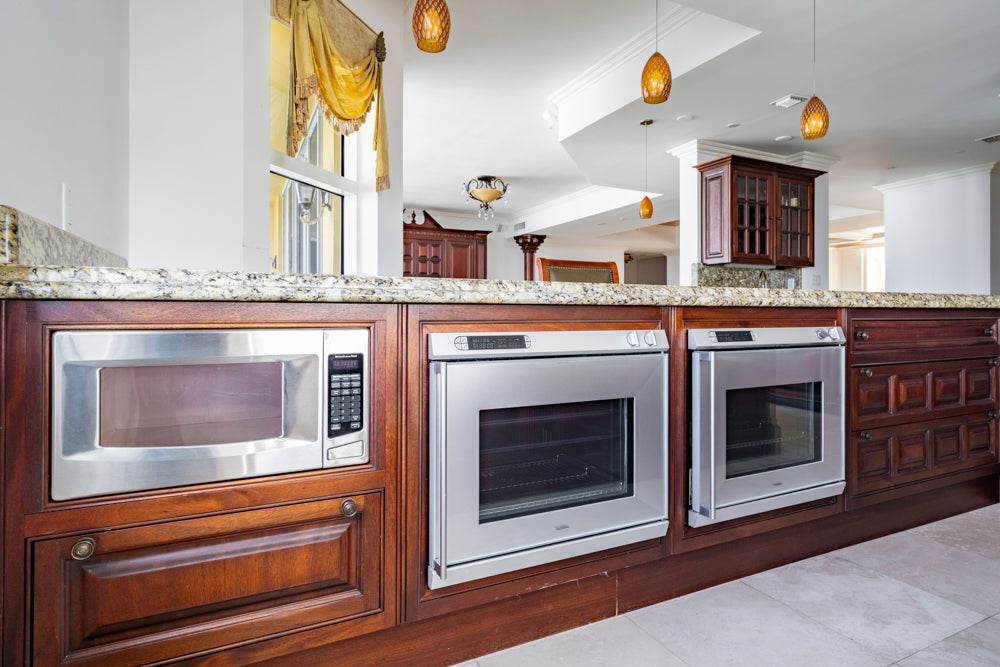 Clive Christian Regency Style Traditional Mahogany Kitchen with Granite Countertops & Gaggenau Appliances
