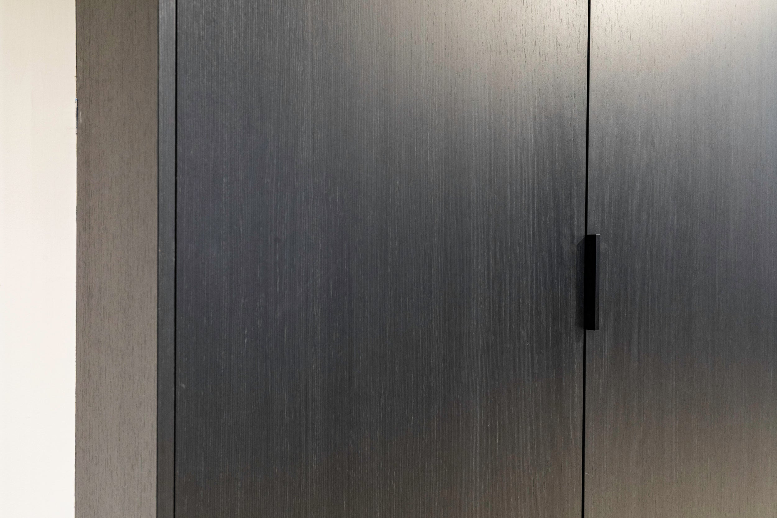 eggersmann USA E-Line Graphite Black Bi-Fold Pocket Door Pantry Wall