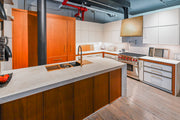 Aster Cucine Modern Two-Tone Kitchen with Dekton Countertops and Wolf Range