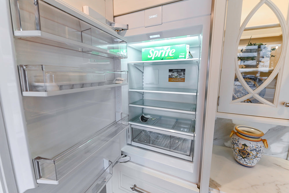 Showcase Transitional White Kitchen with Marble Countertops and La Cornue Chateau 120 Range with French Top