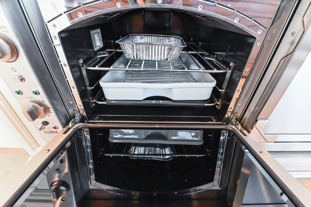 Showcase Transitional White Kitchen with Marble Countertops and La Cornue Chateau 120 Range with French Top