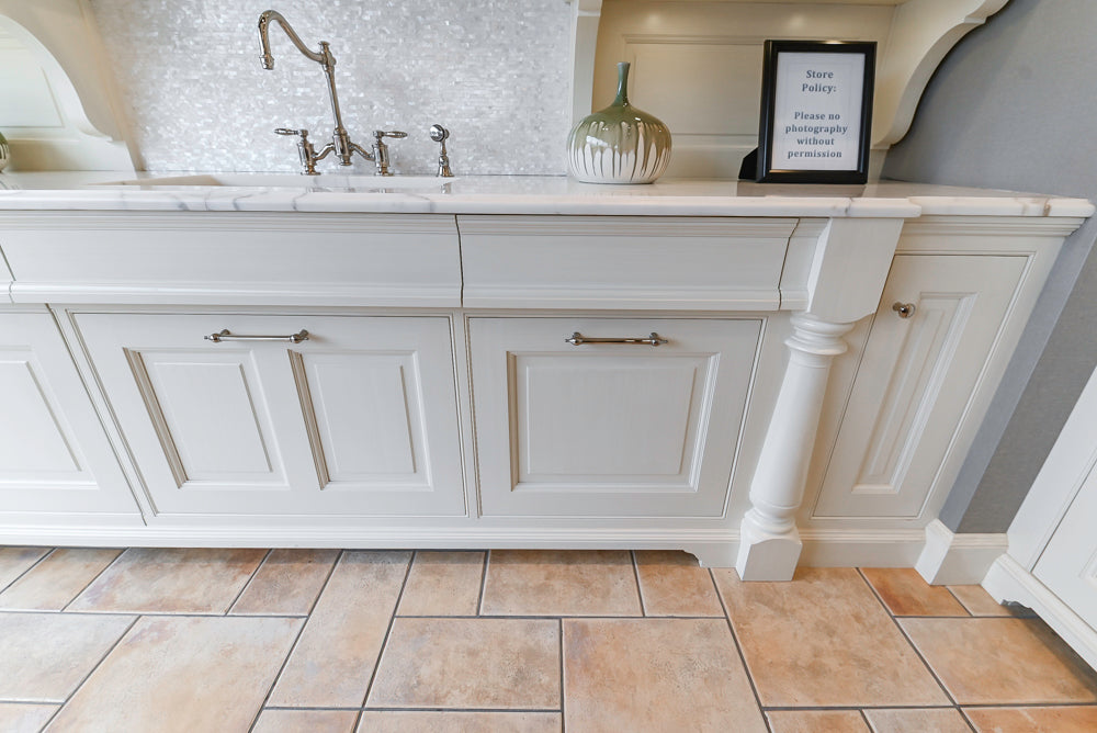 Showcase Transitional White Kitchen with Marble Countertops and La Cornue Chateau 120 Range with French Top