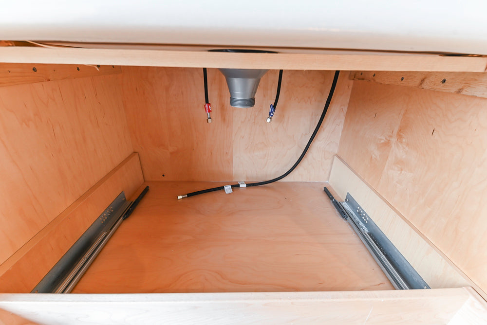 Showcase Transitional White Kitchen with Marble Countertops and La Cornue Chateau 120 Range with French Top