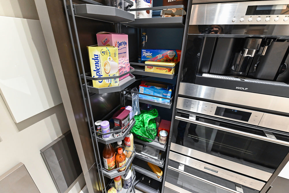 Composit Modern Brown Kitchen with Waterfall Island, Stone Countertops and Wolf & Sub-Zero Appliances
