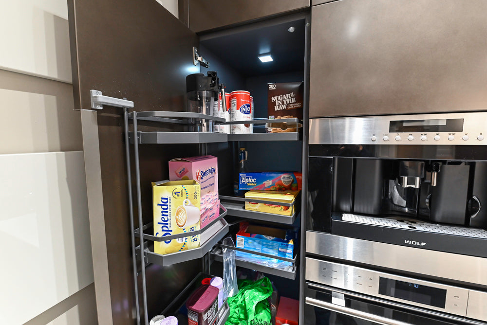 Composit Modern Brown Kitchen with Waterfall Island, Stone Countertops and Wolf & Sub-Zero Appliances