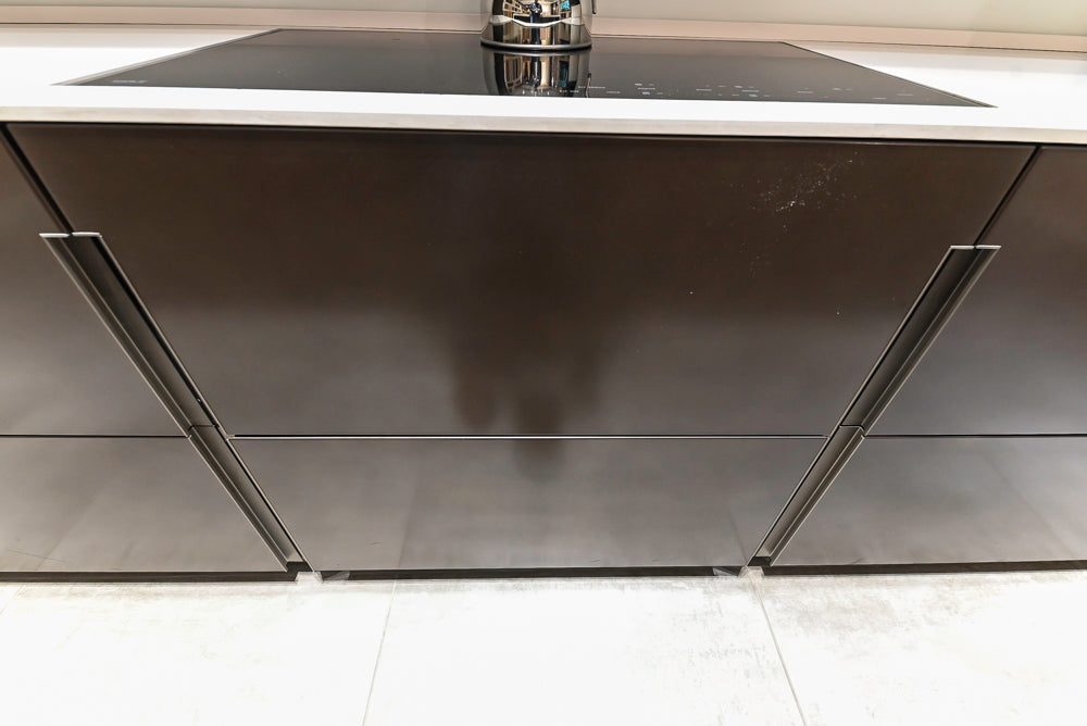 Composit Modern Brown Kitchen with Waterfall Island, Stone Countertops and Wolf & Sub-Zero Appliances