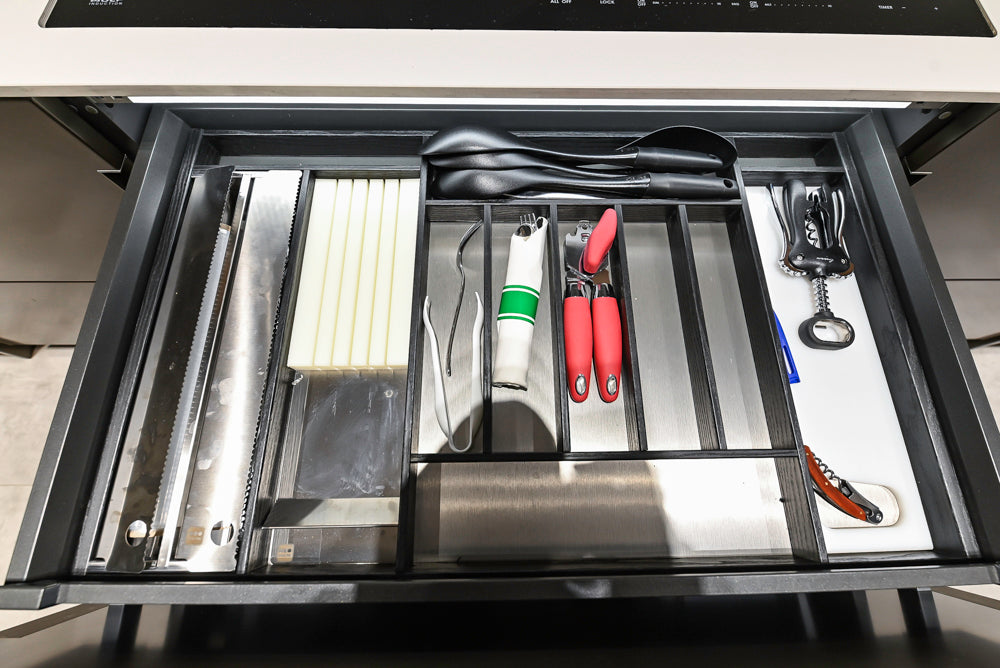 Composit Modern Brown Kitchen with Waterfall Island, Stone Countertops and Wolf & Sub-Zero Appliances