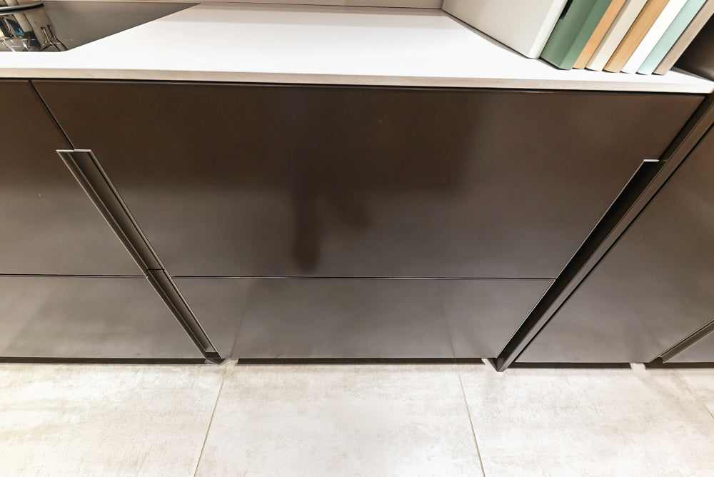 Composit Modern Brown Kitchen with Waterfall Island, Stone Countertops and Wolf & Sub-Zero Appliances