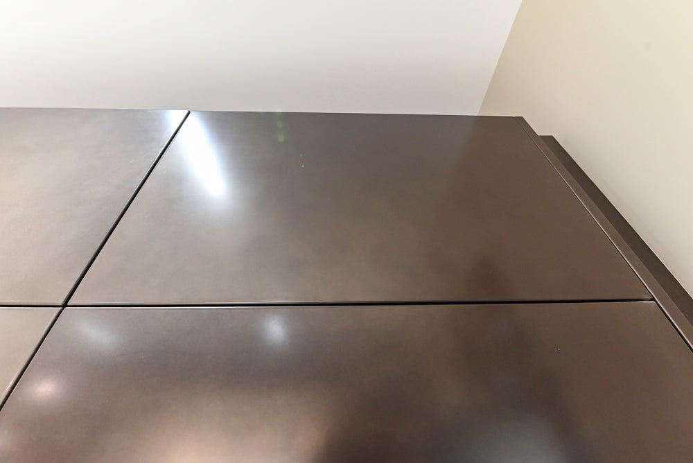 Composit Modern Brown Kitchen with Waterfall Island, Stone Countertops and Wolf & Sub-Zero Appliances