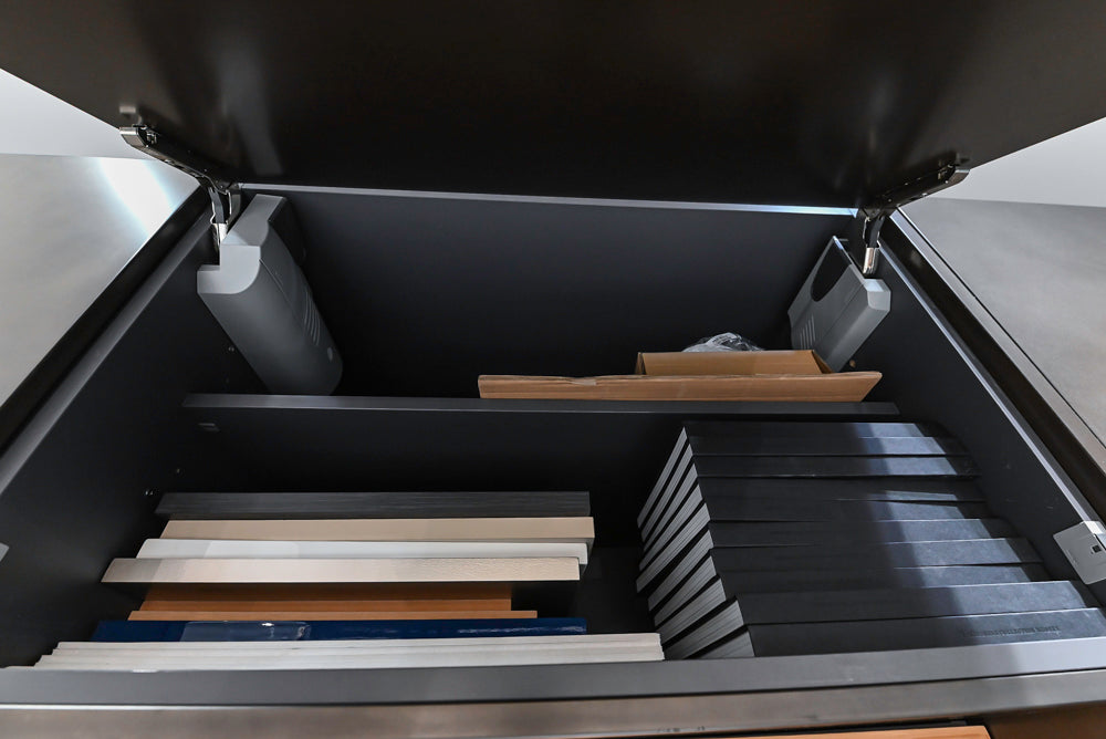 Composit Modern Brown Kitchen with Waterfall Island, Stone Countertops and Wolf & Sub-Zero Appliances