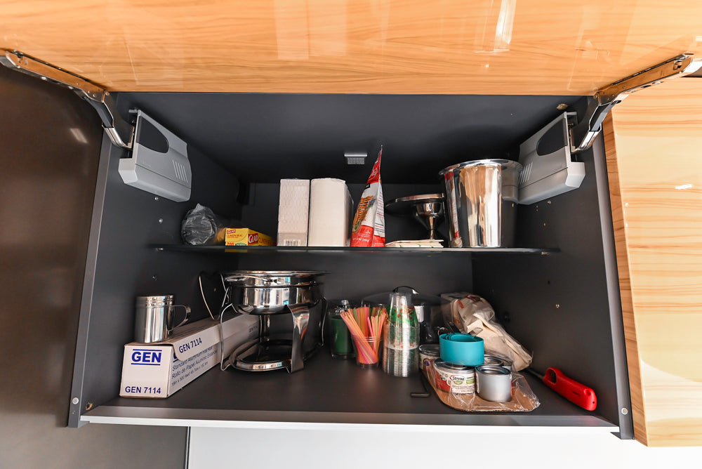 Composit Modern Brown Kitchen with Waterfall Island, Stone Countertops and Wolf & Sub-Zero Appliances
