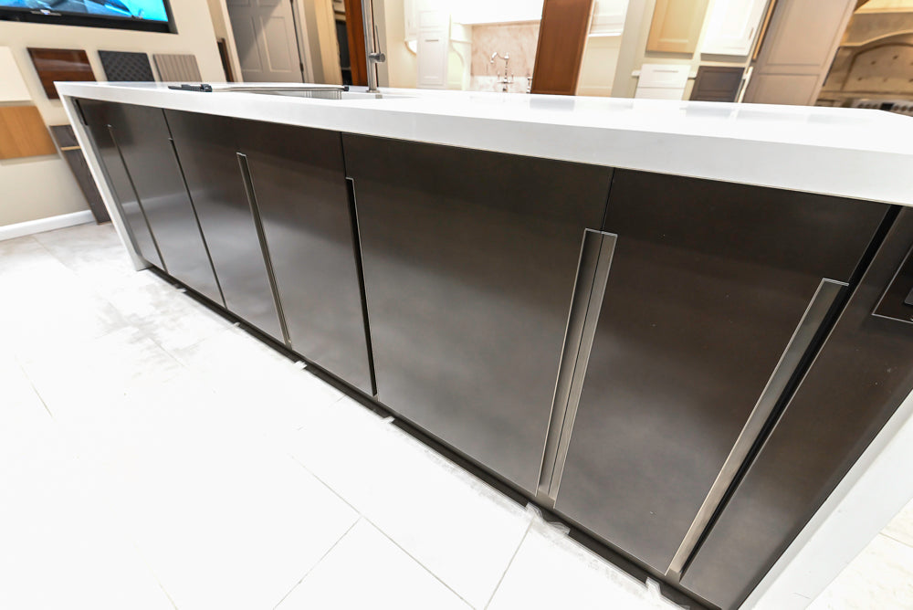 Composit Modern Brown Kitchen with Waterfall Island, Stone Countertops and Wolf & Sub-Zero Appliances