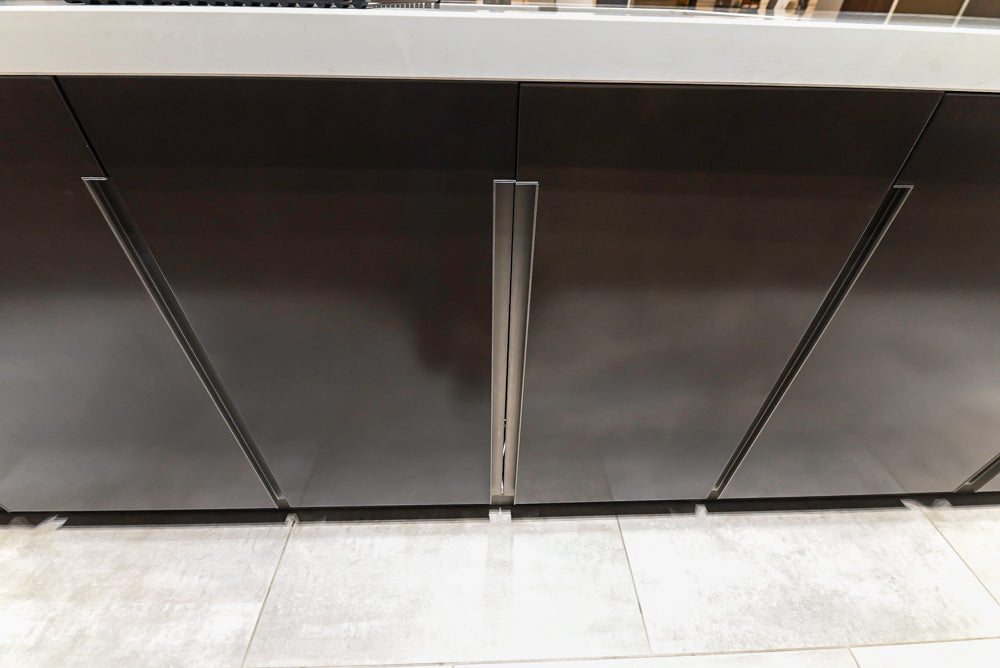 Composit Modern Brown Kitchen with Waterfall Island, Stone Countertops and Wolf & Sub-Zero Appliances