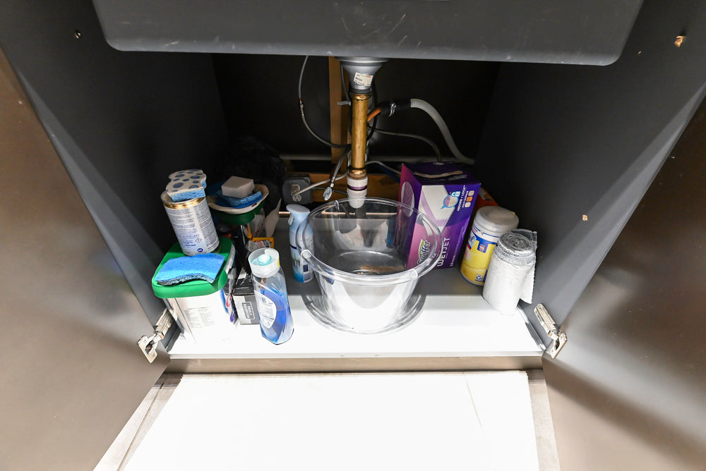 Composit Modern Brown Kitchen with Waterfall Island, Stone Countertops and Wolf & Sub-Zero Appliances