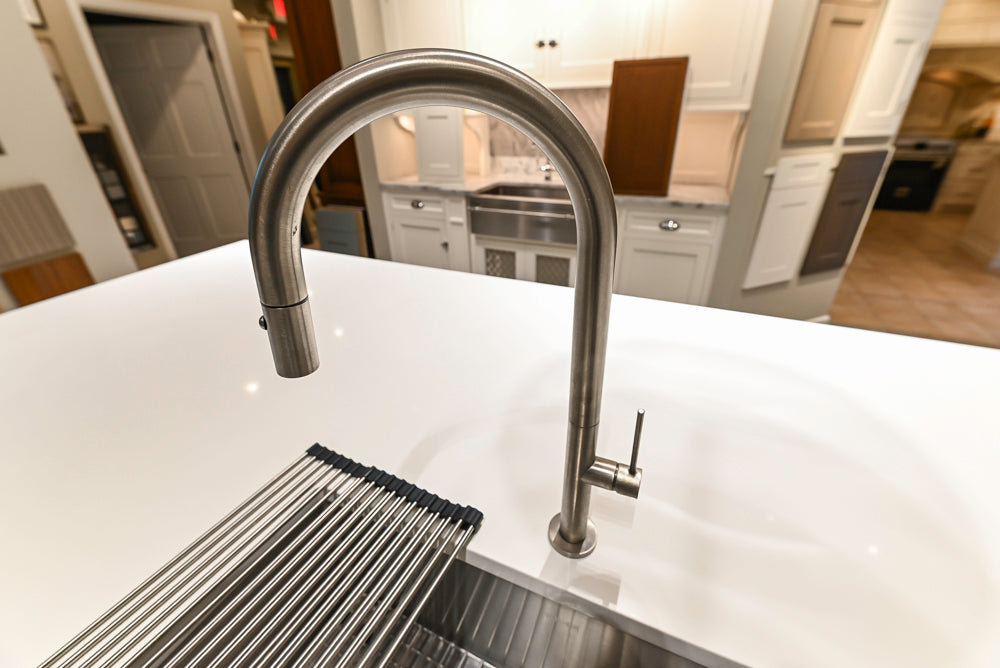 Composit Modern Brown Kitchen with Waterfall Island, Stone Countertops and Wolf & Sub-Zero Appliances