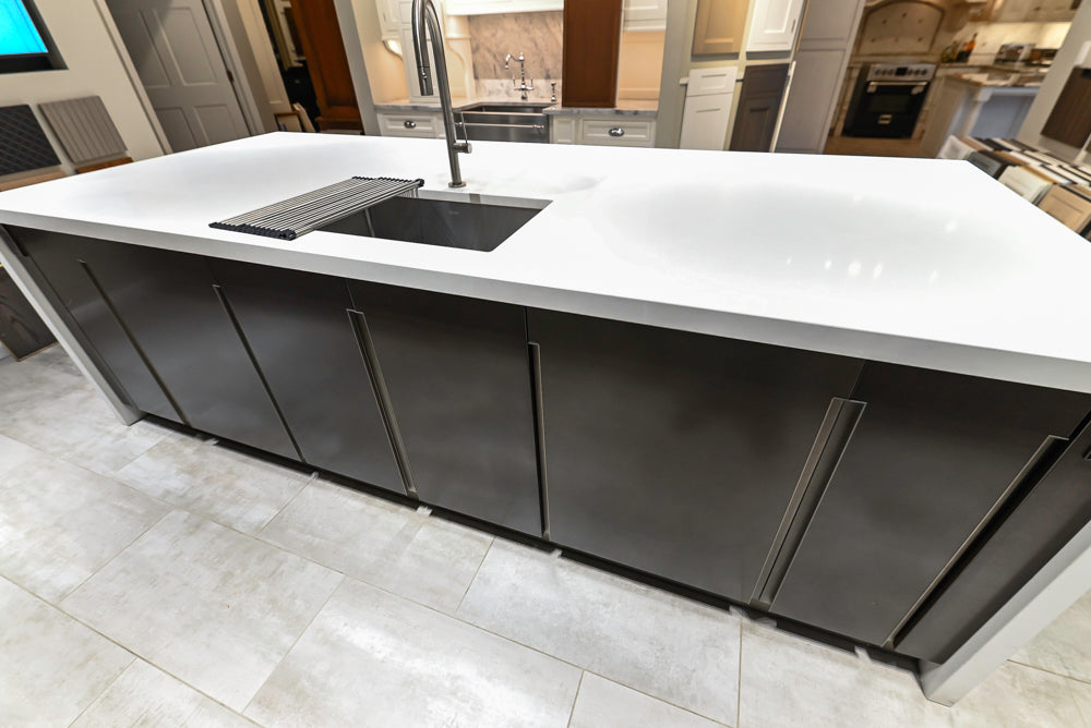 Composit Modern Brown Kitchen with Waterfall Island, Stone Countertops and Wolf & Sub-Zero Appliances