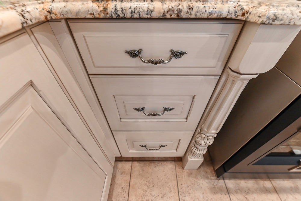 Signature Custom Traditional White Kitchen with Granite Countertops and Appliances