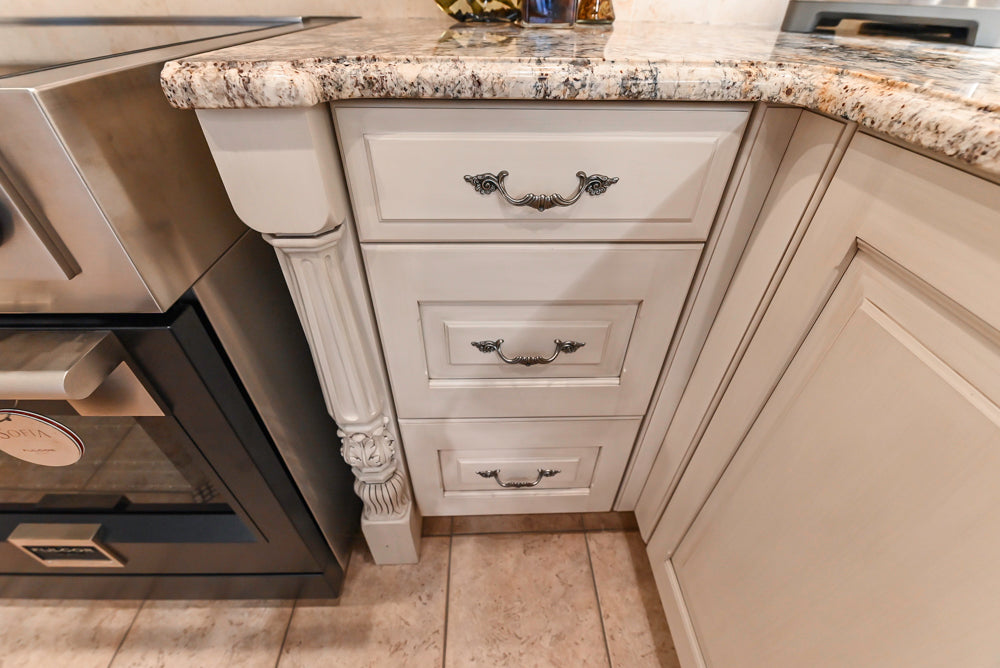 Signature Custom Traditional White Kitchen with Granite Countertops and Appliances