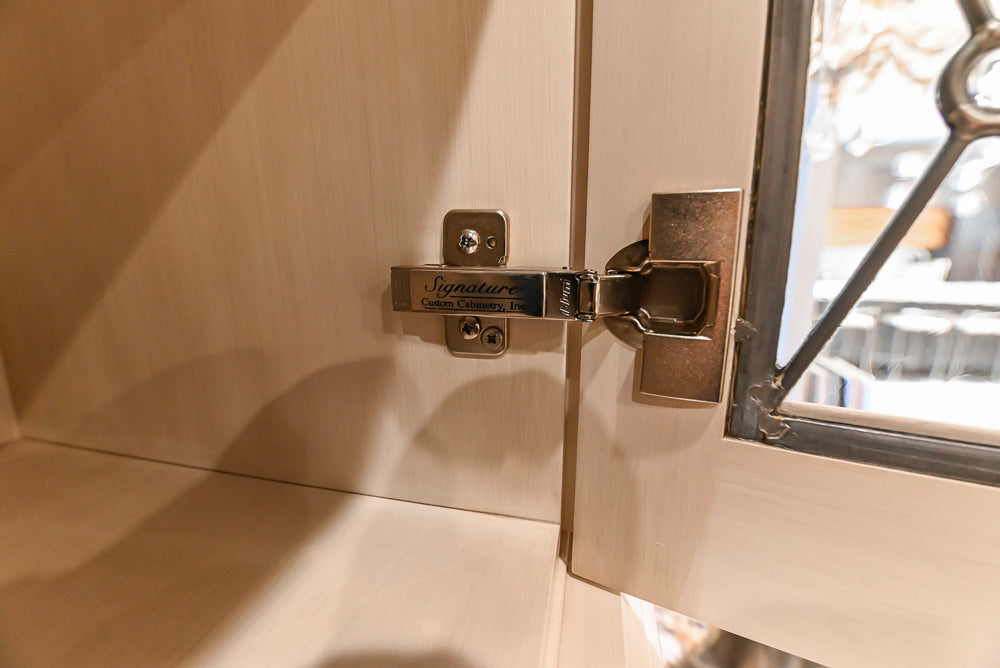 Signature Custom Traditional White Kitchen with Granite Countertops and Appliances