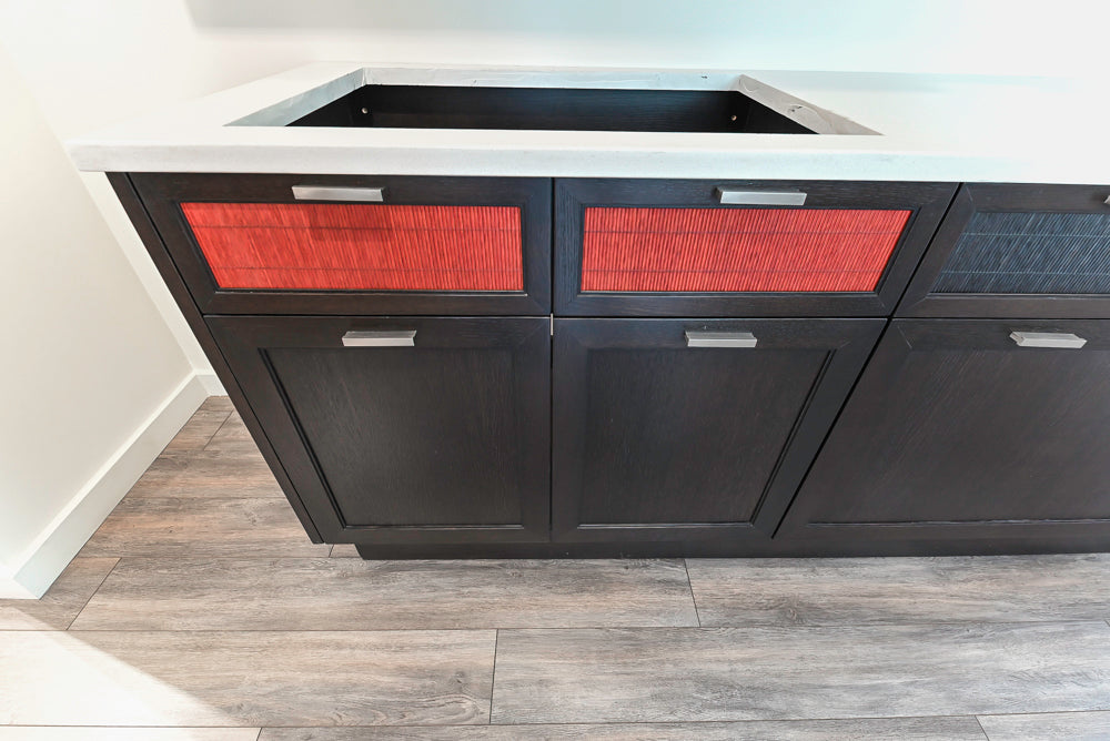 Bamax custom Italian cooking wall solid oak frame with vibrant red bamboo inset cabinet doors front view