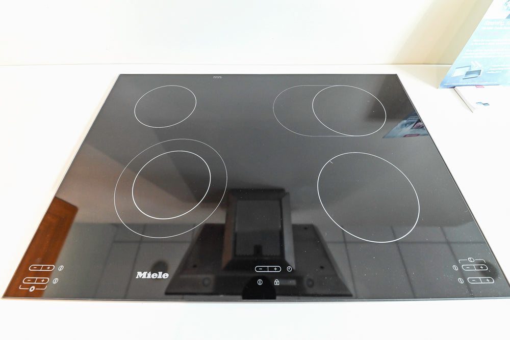 Aster Cucine Modern Glossy Black Curvy Kitchen with Miele Appliances