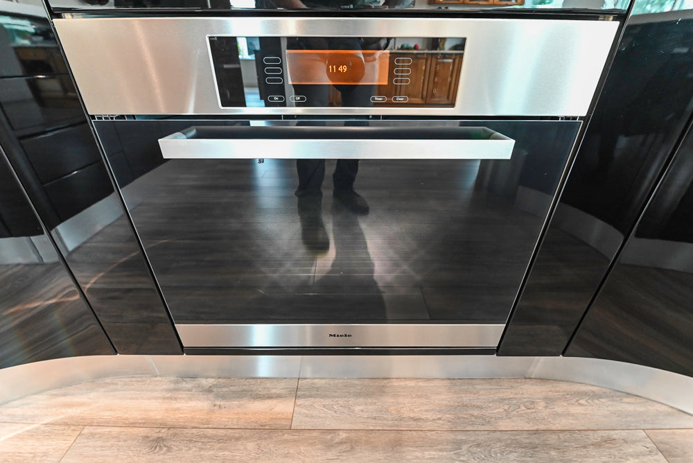 Aster Cucine Modern Glossy Black Curvy Kitchen with Miele Appliances
