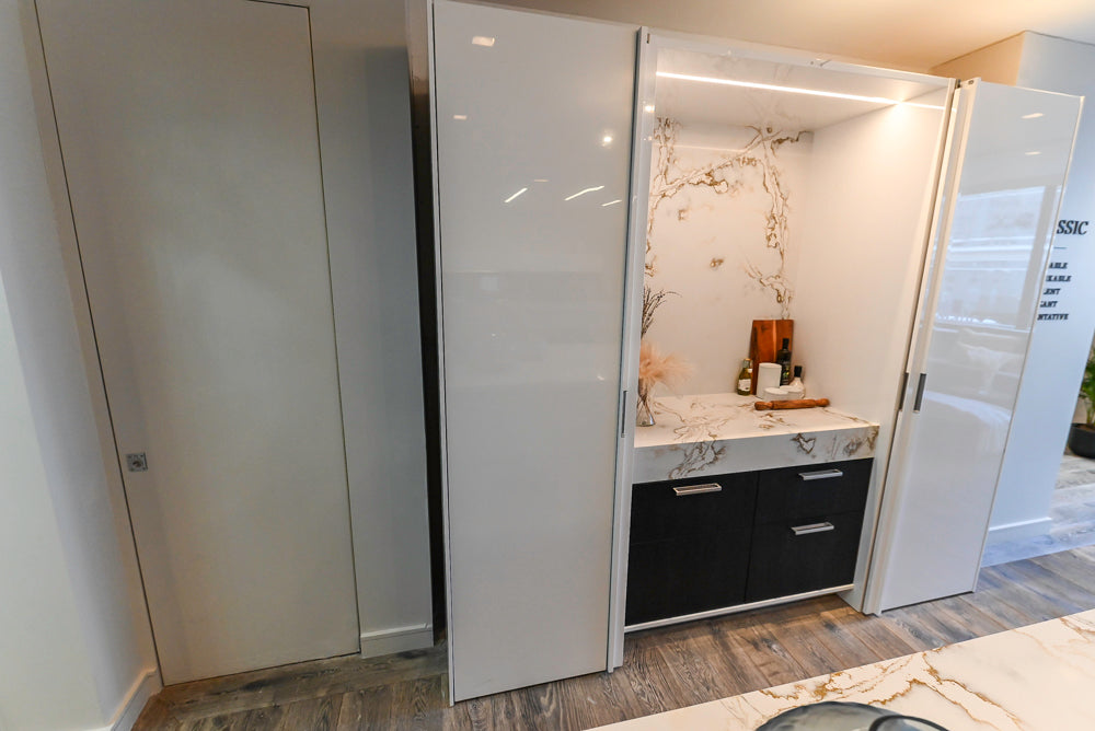 SieMatic S2 Modern Rose Gold Handleless Island with Lotus White Hideaway Pantry | photo 63