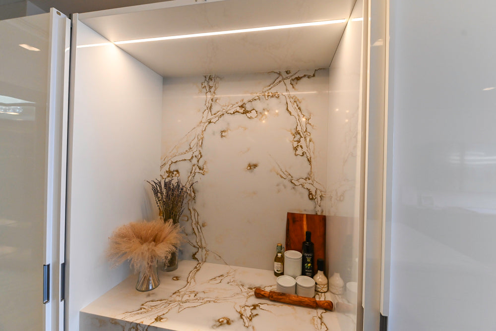 SieMatic S2 Modern Rose Gold Handleless Island with Lotus White Hideaway Pantry | photo 78