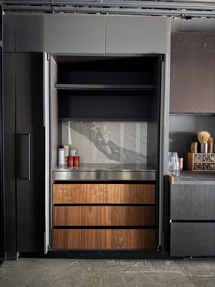 Minimalist 105 inch tall pantry wall with refrigerator panels