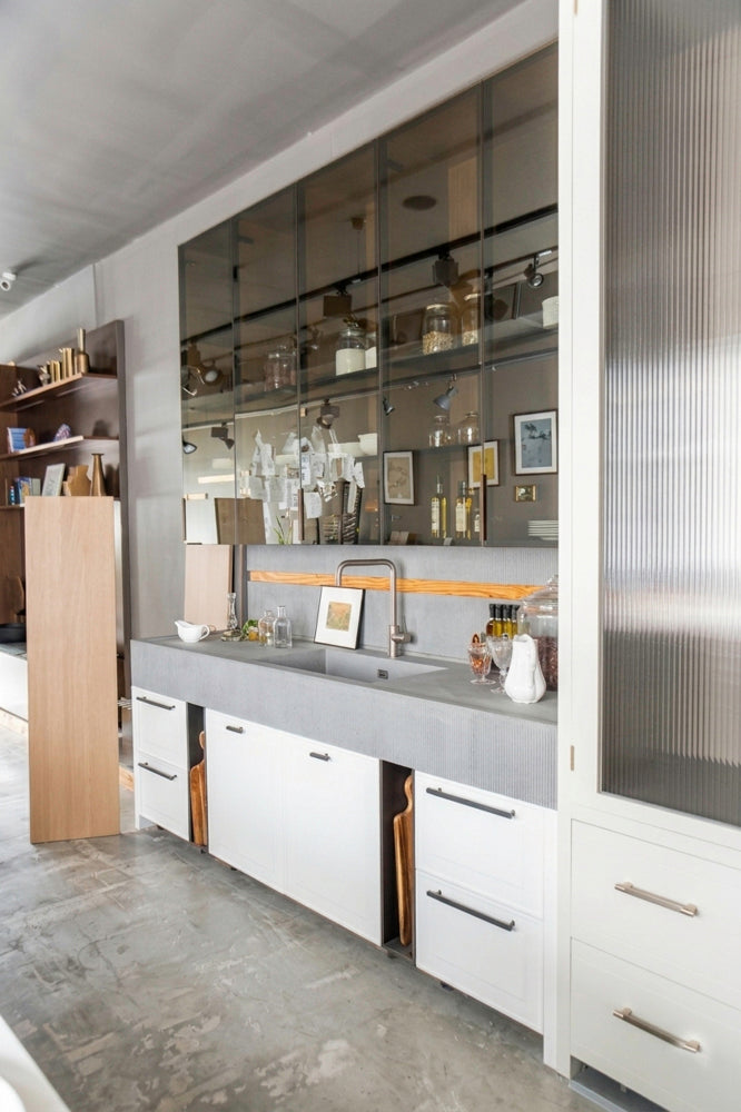 Italian luxury wet bar unit with contemporary faucet and handleless doors