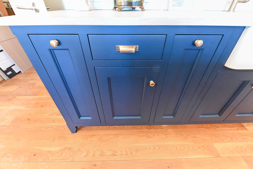 Quality Custom Navy Blue Partial Kitchen with Matching Island and White Farmhouse Sink