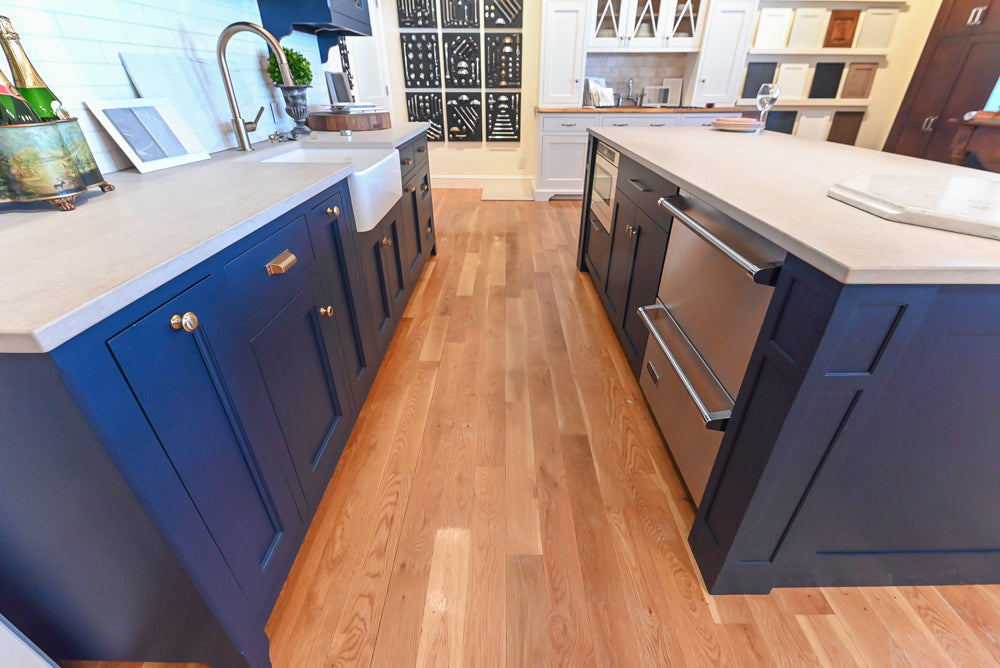 Quality Custom Navy Blue Partial Kitchen with Matching Island and White Farmhouse Sink